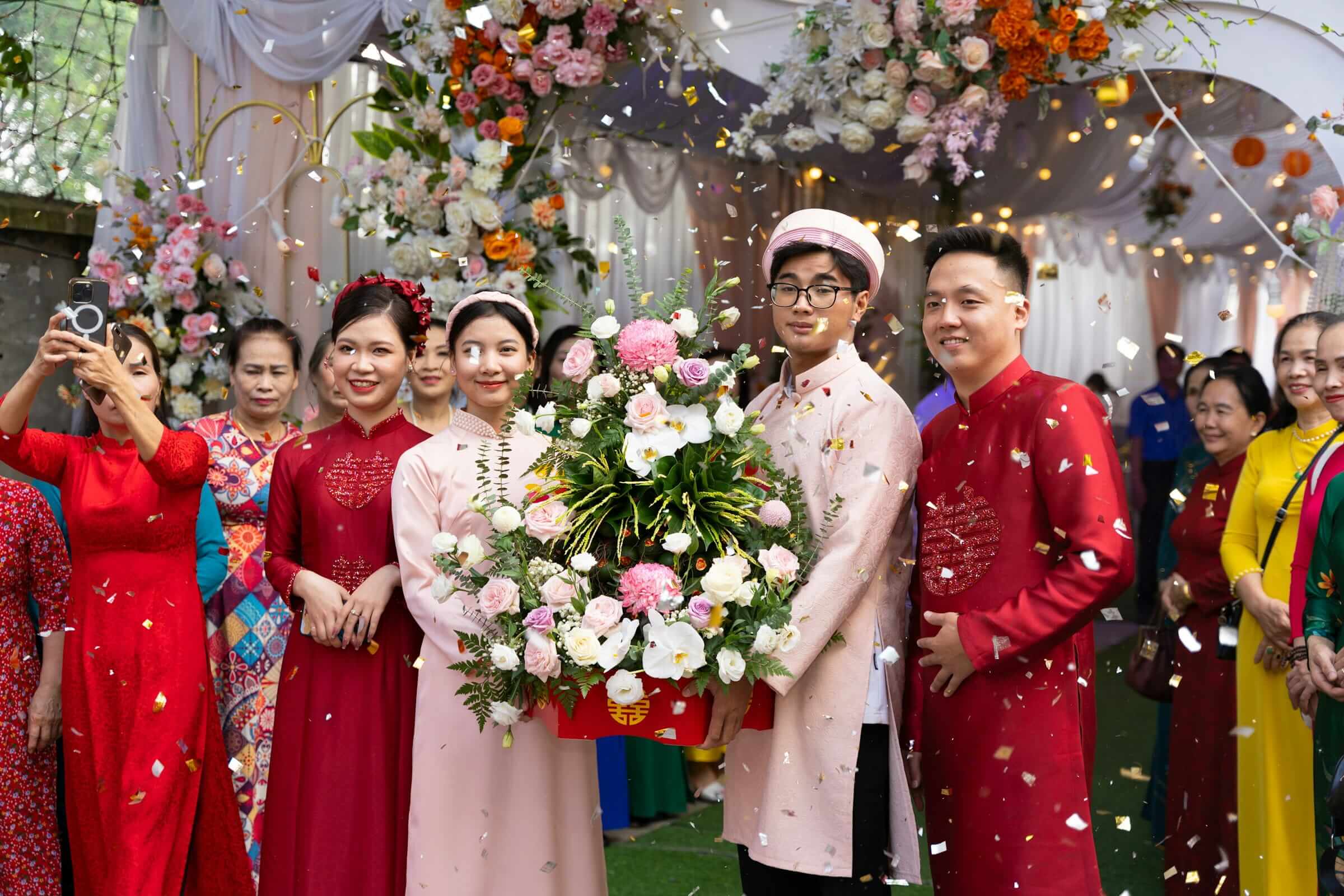 Traditional Malaysian wedding reception with rows of banquet tables and guests