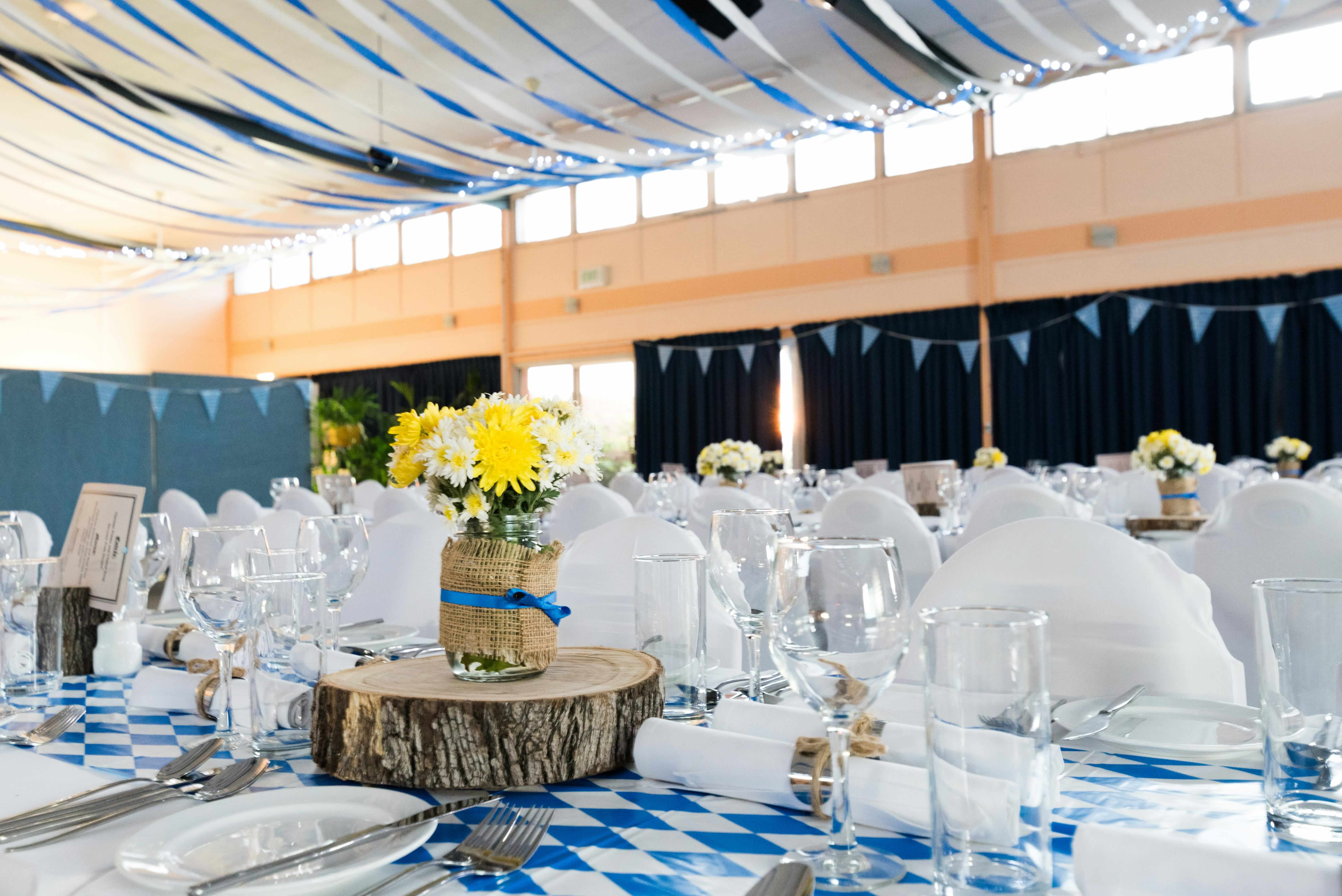 Elegant wedding reception venue with table settings