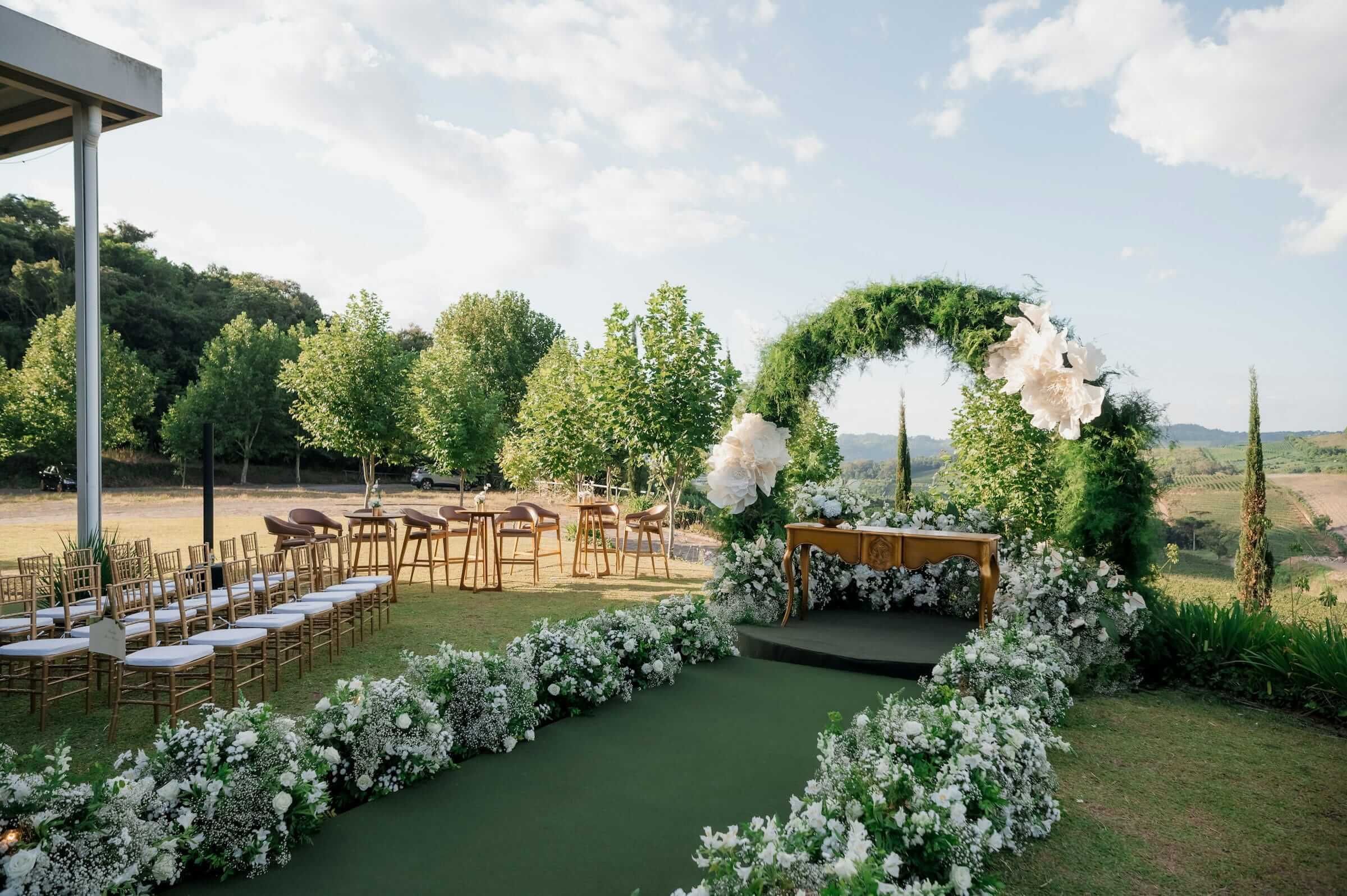 An open-air setting with natural light and greenery